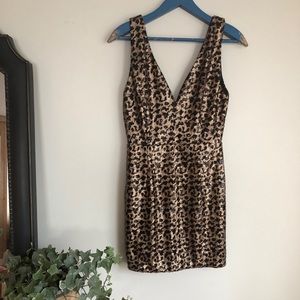 Sequined black and gold mini dress